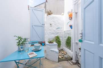 Oh so pretty, the rear courtyard is perfect for al fresco dining.