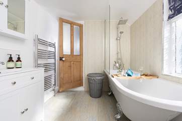 The gorgeous claw-foot bath has a rainfall shower so you get the best of both worlds.