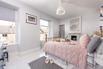 Beautifully decorated in pastel shades, the double bedroom is a delight.