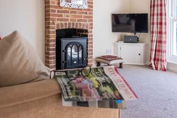Relax and unwind in your holiday bolthole (the wood-burner is ornamental only).