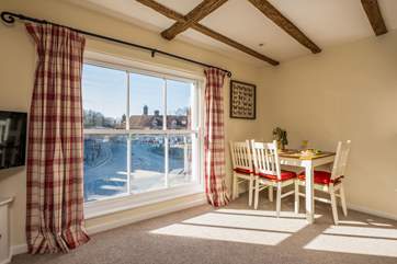Watch the world go by from the floor length windows which overlook the main square and Abbey.