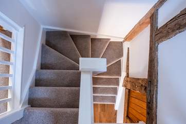 Set over two floors, stairs lead to the two bedrooms and family bathroom.