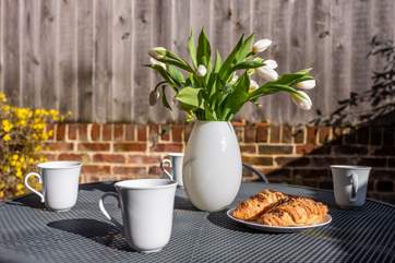 Catch the sun's rays on the patio.