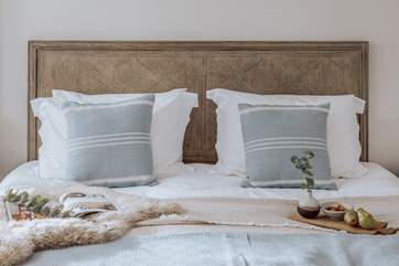 The delightfully furnished bedroom 2 has a super-king bed, fabulous en suite and direct access to the outside deck where you can take in the fresh air with a morning cuppa.