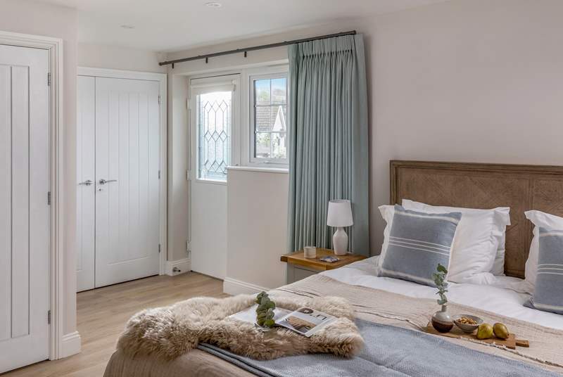 With access to the outside space, bedroom 2 is simply lovely.