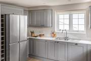 The kitchen has a double size fridge/freezer, perfect for keeping holiday drinks cool.