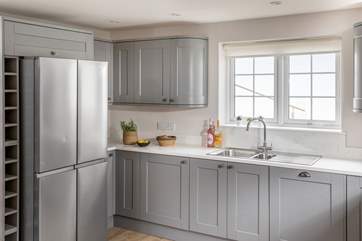 The kitchen has a double size fridge/freezer, perfect for keeping holiday drinks cool.