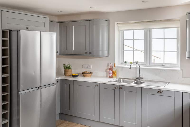 The kitchen has a double size fridge/freezer, perfect for keeping holiday drinks cool.