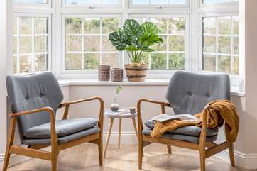 Relax in the bay window of this beautiful holiday home.