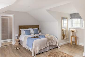 Four beautiful bedrooms await, all with luxury linens.