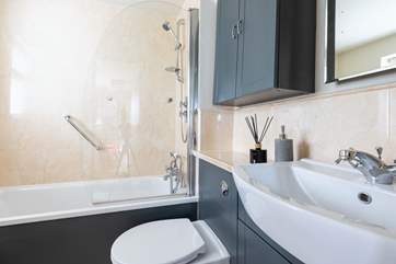 The family bathroom is perfect for a long soak after a busy day.