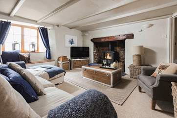The fabulous feature fireplace with wood-burner for cosy nights in at any time of year.