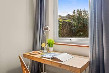 This well-placed desk space overlooks your private courtyard.