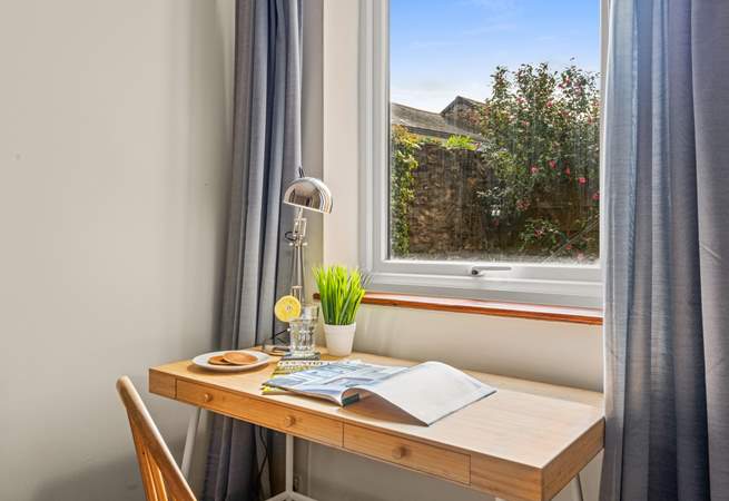 This well-placed desk space overlooks your private courtyard.