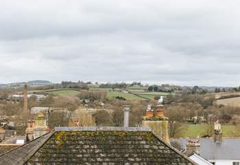 The view out of the living-room window. You can see out over Totnes and over the rolling countryside in the distance.