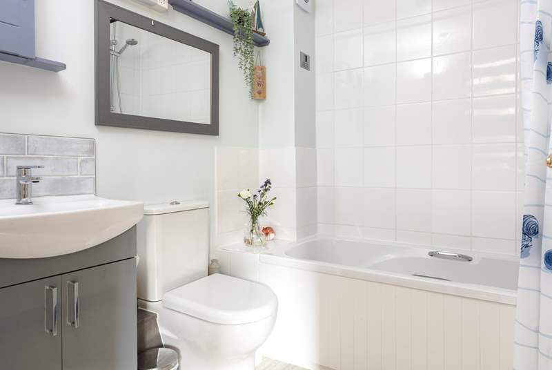 The modern family bathroom is perfect for a long soak in the bath or a refreshing shower.
