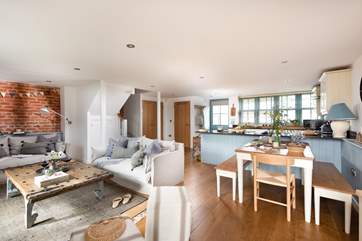 The open plan living space is bright and airy.