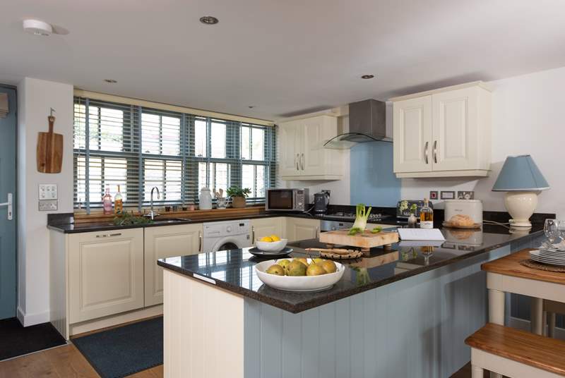 Cook up the perfect family meal in this well-equipped kitchen.