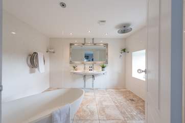 The principal bedroom has the most opulent bathroom with free-standing bath and waterfall shower.