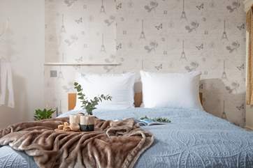 The cosy king-size bed.