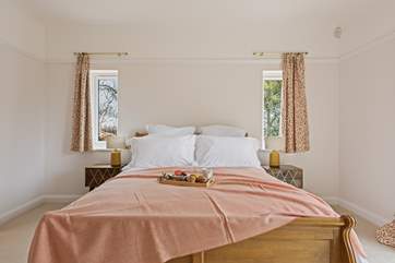Bedroom 1, with luxury linens to ensure a great night's sleep.