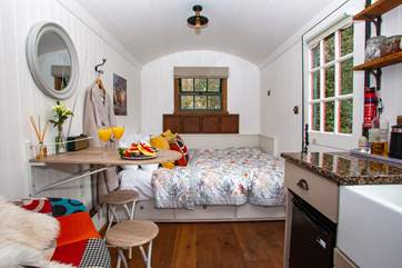 There's a cosy double bed and plenty of room inside for two. The perfect romantic getaway!