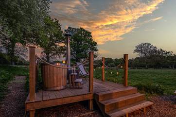Relax in the woodfired hot tub and watch the sun set over the horizon.