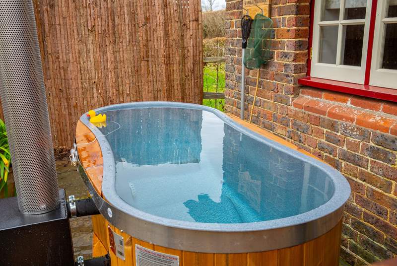 The divine wood-fired hot tub, the perfect way to relax.