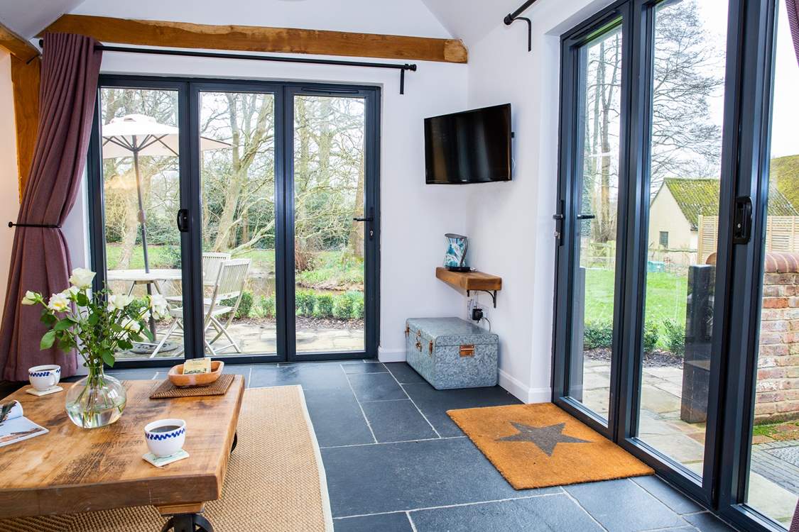 The sitting-area overlooks the lovely gardens.