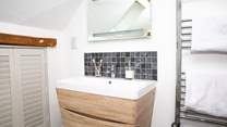 The en suite wet-room for a refreshing shower after a busy day exploring.
