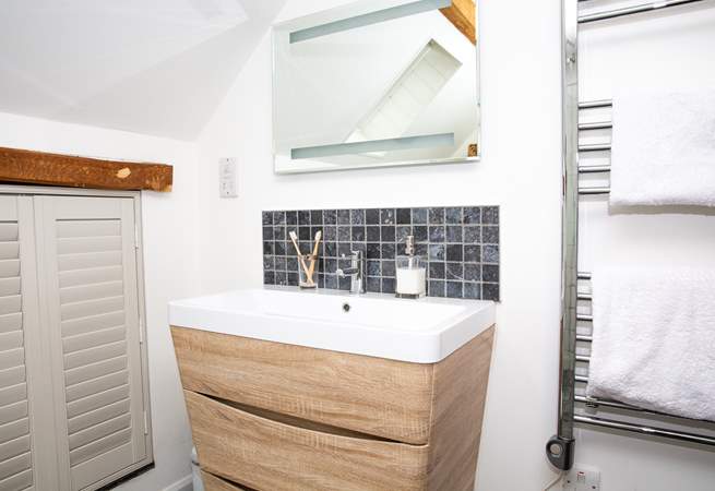 The en suite wet-room for a refreshing shower after a busy day exploring.