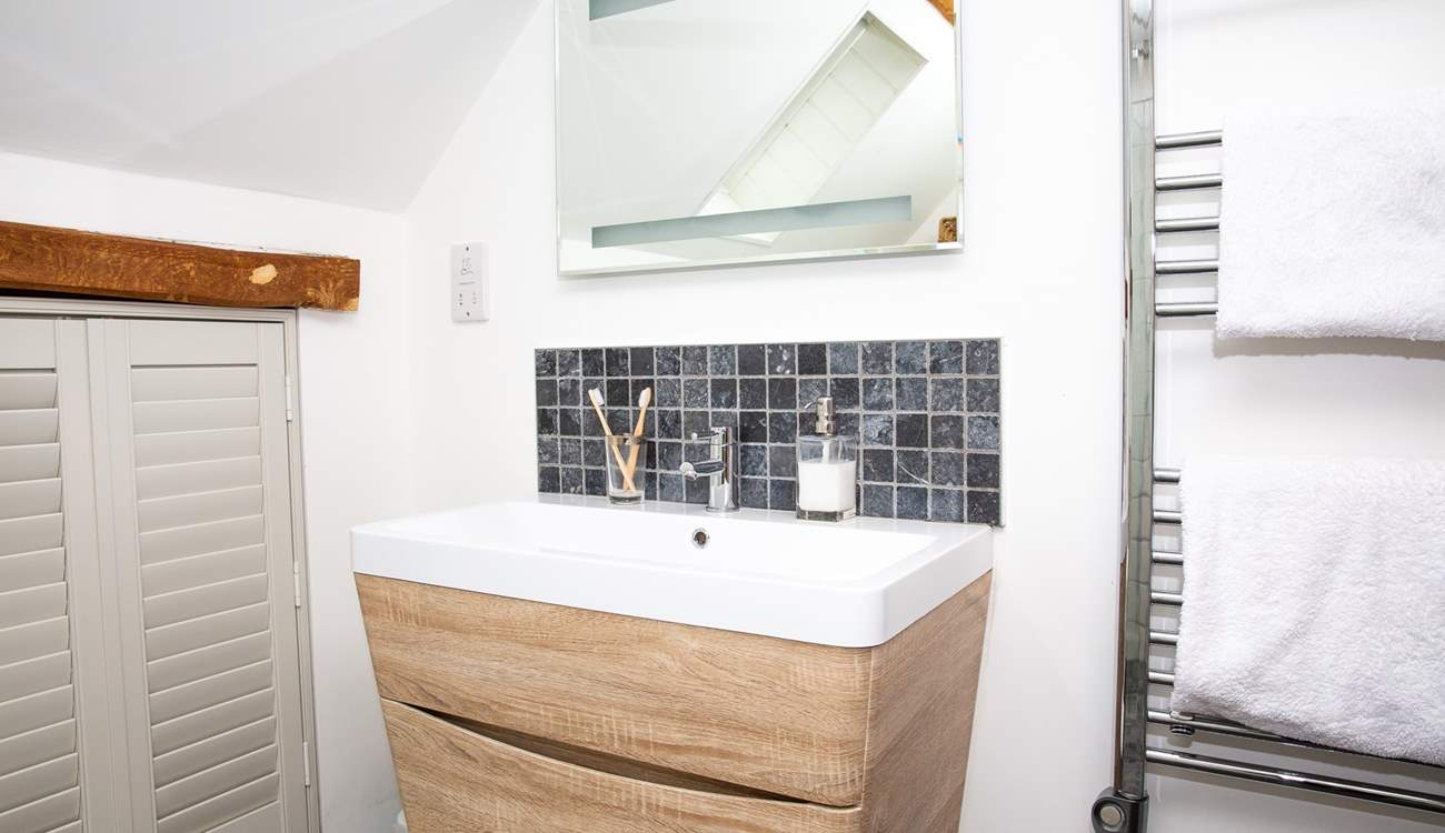 The en suite wet-room for a refreshing shower after a busy day exploring.