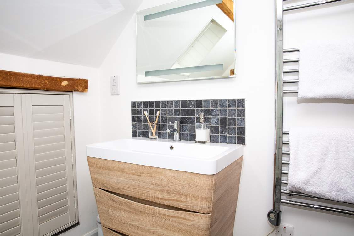 The en suite wet-room for a refreshing shower after a busy day exploring.