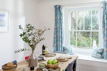 Gather everyone around the table in the separate dining room to chat about the day's adventures.