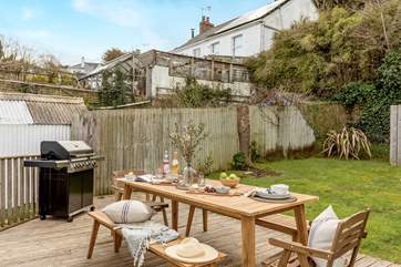 The lovely decked area overlooks the lawn.