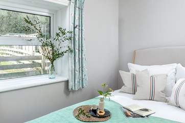 Bedroom 3 has a lovely double bed and sunny outlook.