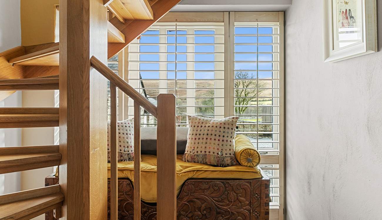 The stairs take you to the lower level where you will find the bedrooms.