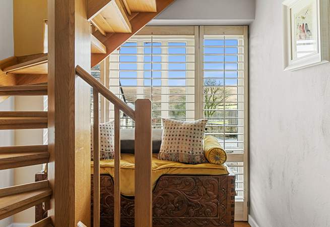 The stairs take you to the lower level where you will find the bedrooms.