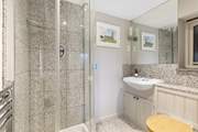 Bedroom 2 has the added luxury of an en suite shower-room.