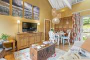 A comfortable living space with ornate furniture and features throughout.