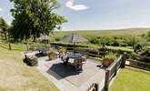 Enjoy the guests' garden whilst soaking in the view and meeting your neighbours as you cook up a holiday feast on the barbecue. - Thumbnail Image