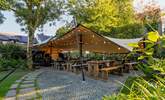 The fabulous outside seating area at the Castle Inn, Lydford is perfect for al fresco dining. - Thumbnail Image