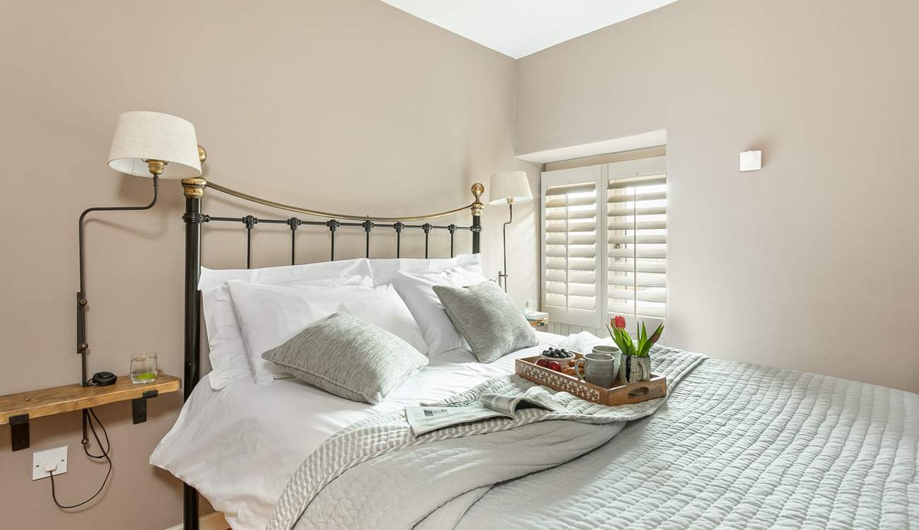 Gorgeous bedroom two has a king-sized bed.