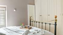 Bedroom two has plenty of cupboard space for all of your belongings.