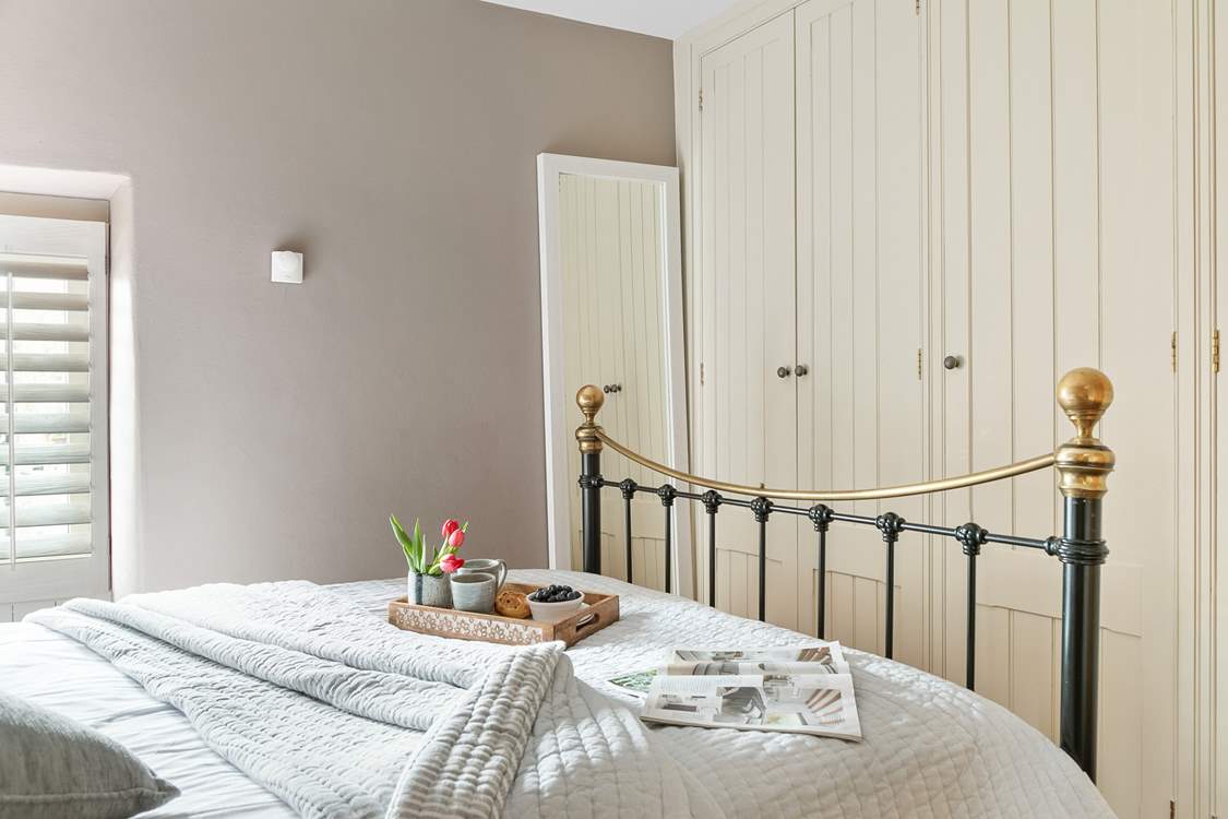 Bedroom two has plenty of cupboard space for all of your belongings.