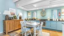 This open plan living space is fresh, bright and perfect for cooking up a feast.