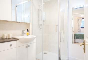 The en suite shower-room which like the rest of the apartment is bright and airy