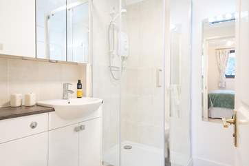 The en suite shower-room which like the rest of the apartment is bright and airy
