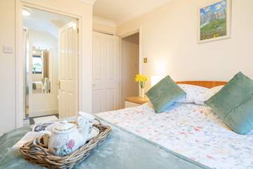 The main bedroom with en suite shower facilities.