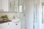 The en suite shower room which like the rest of the apartment is bright and airy